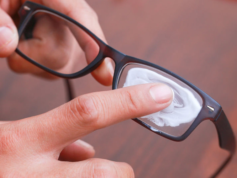 Rub the soap gently on lenses